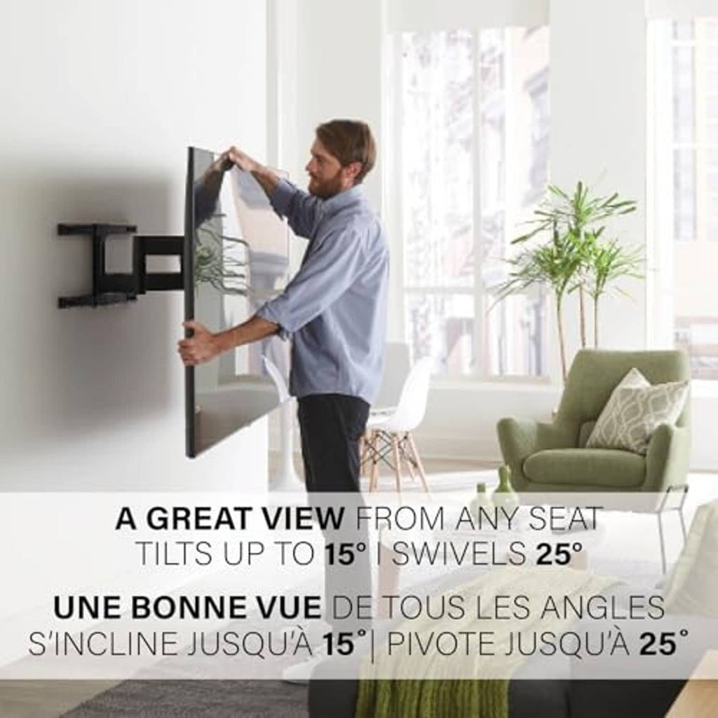 Black full-motion TV wall mount on wall with mounting plate and support arms