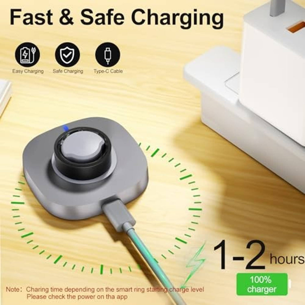 Gray charging dock with USB-C cable resting on wood surface