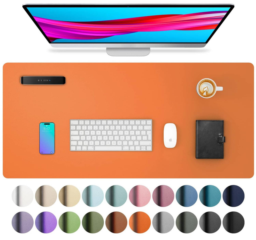 Orange leather desk pad protector with flat lay style and matching accessories layout