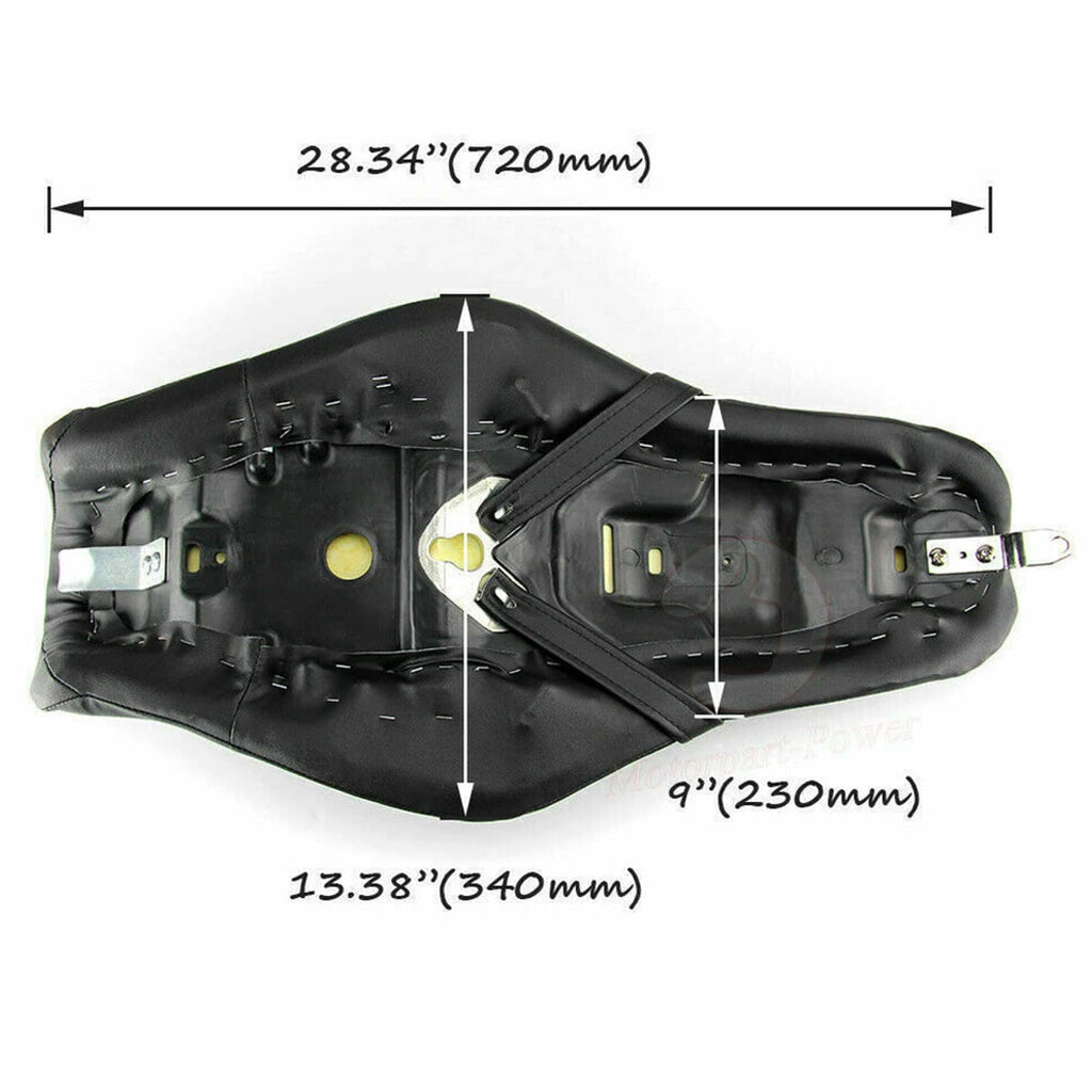 Underside of black motorcycle seat pan with mounting straps and hardware