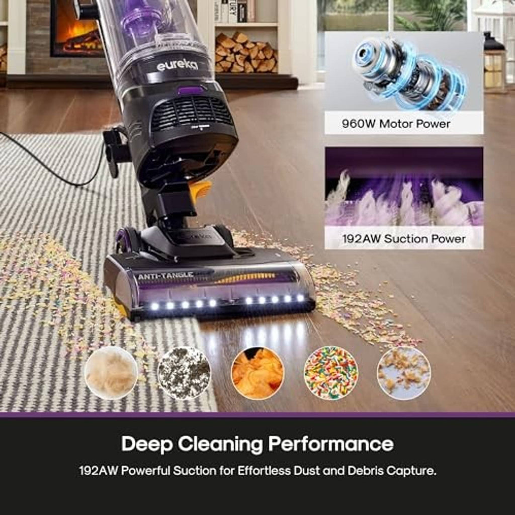 Upright vacuum cleaner with glowing brush bar cleaning a carpet surface