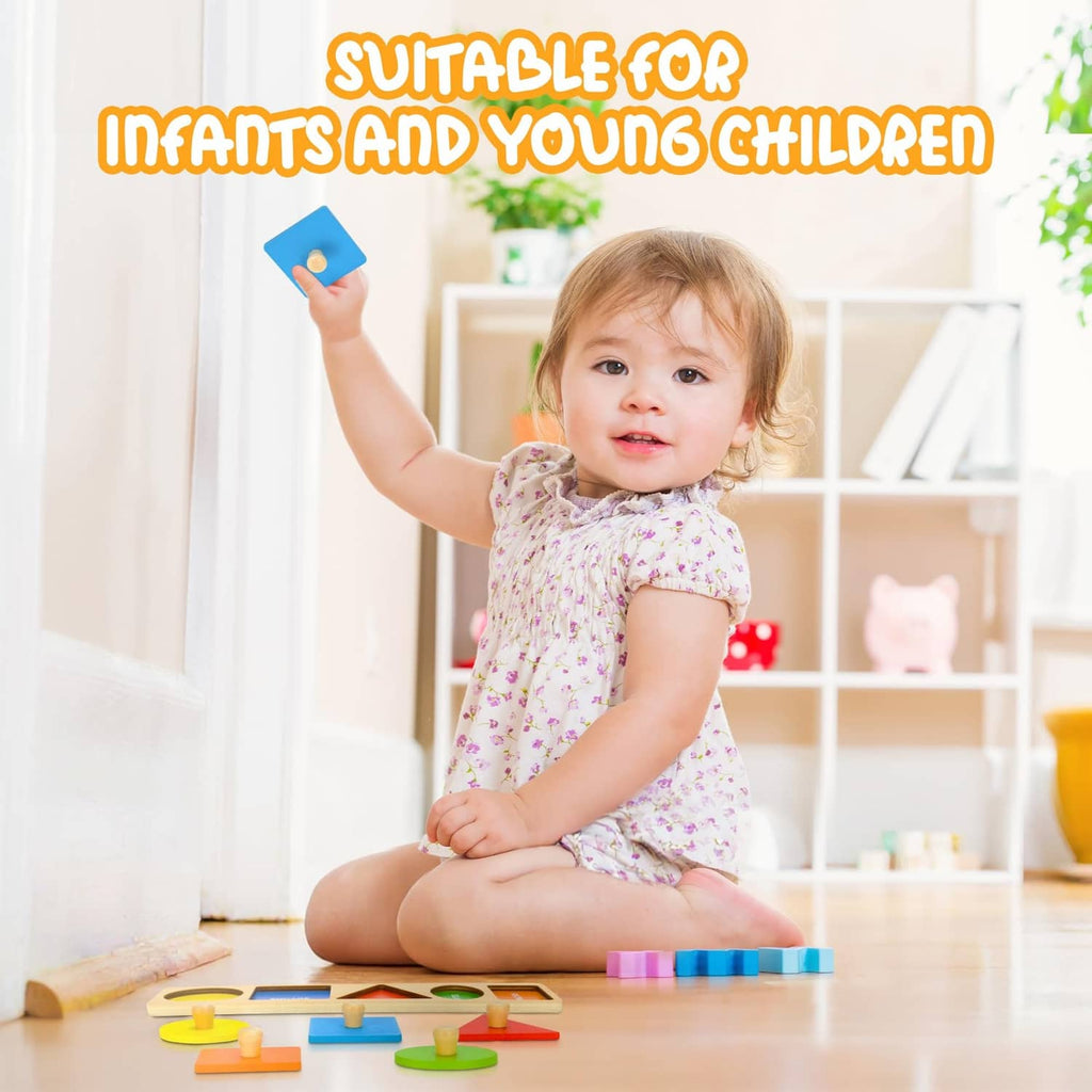 Child using wooden shape puzzle with colored pieces and wooden knob shapes on the floor