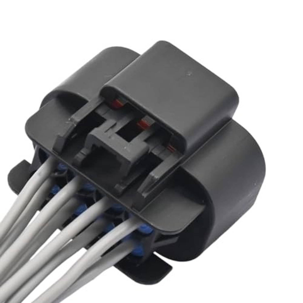 Connector assembly with gray wire leads, dark gray housing, locking tabs visible