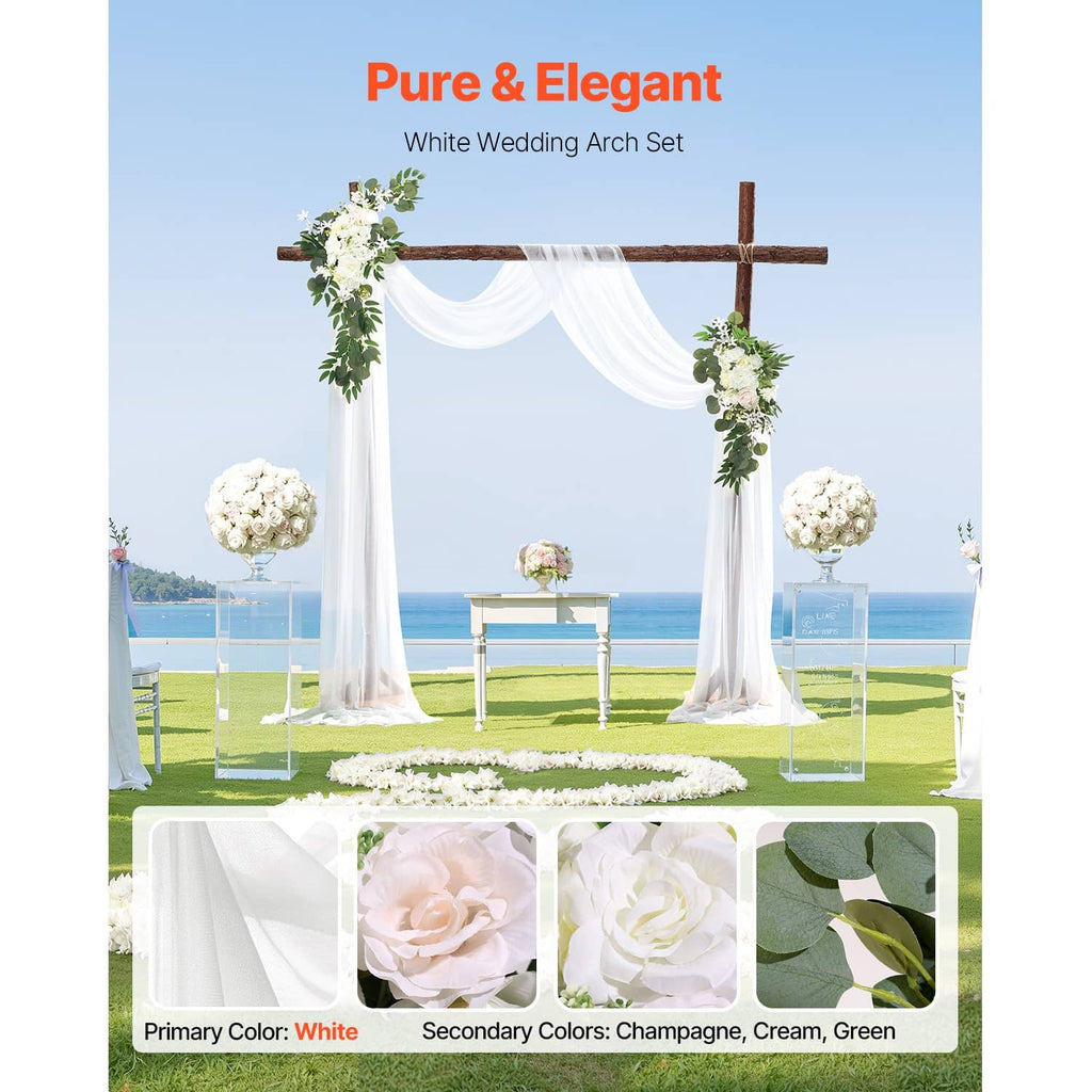 White wedding arch set with sheer drapes and faux greenery corner flower arrangements