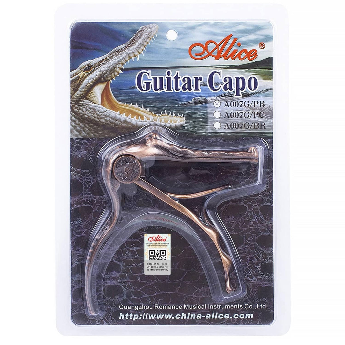 Alligator-style guitar capo in blister packaging, bronze clamp