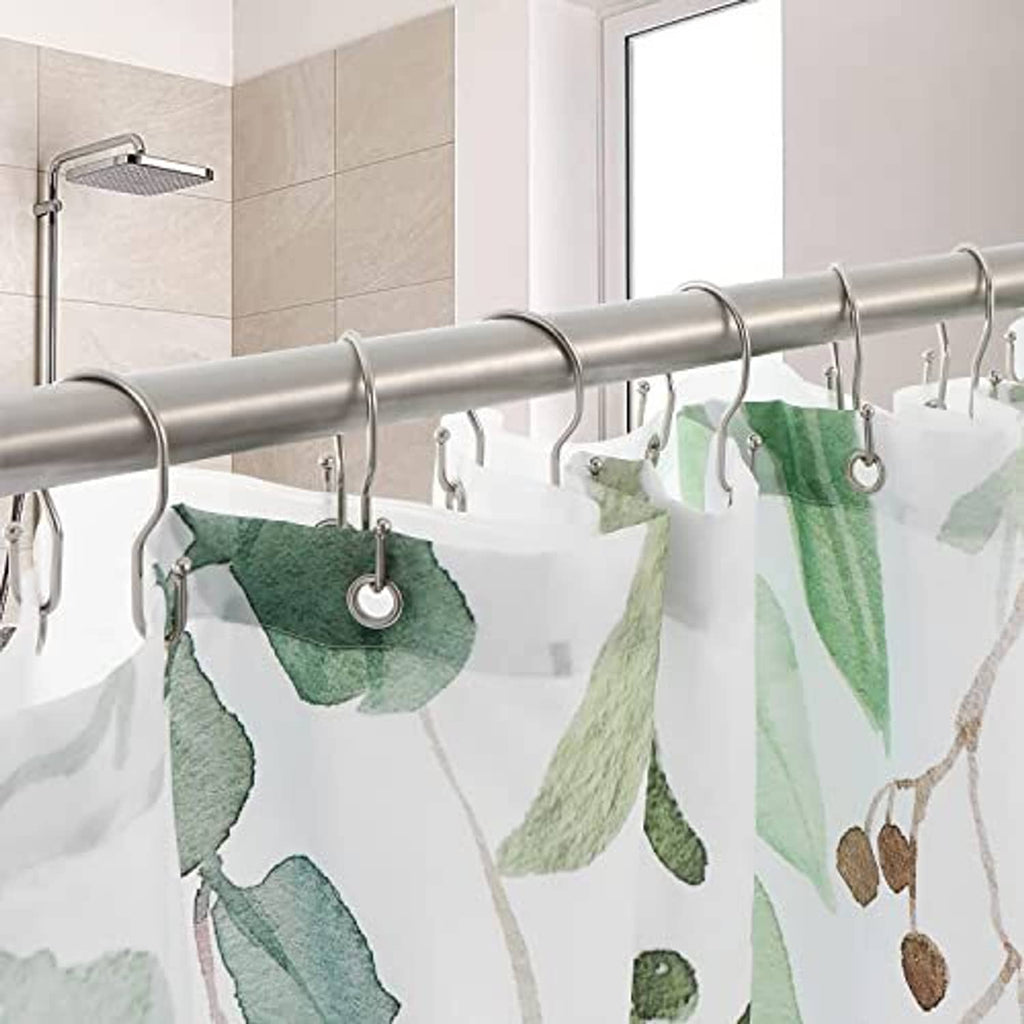 Double shower curtain hooks holding fabric on chrome rod, shiny loop ends and ball tips
