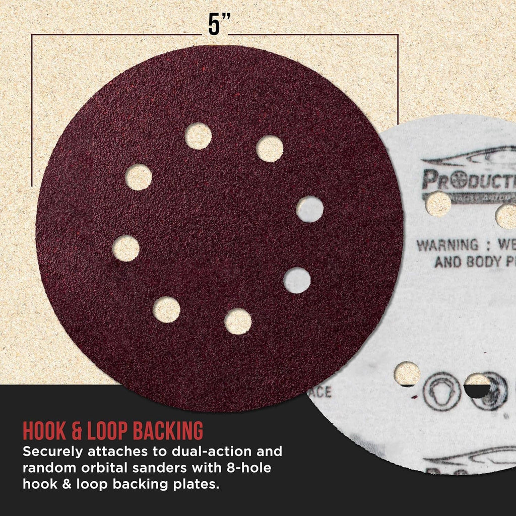5-inch red 8-hole sanding disc close-up with central sanding pad holes