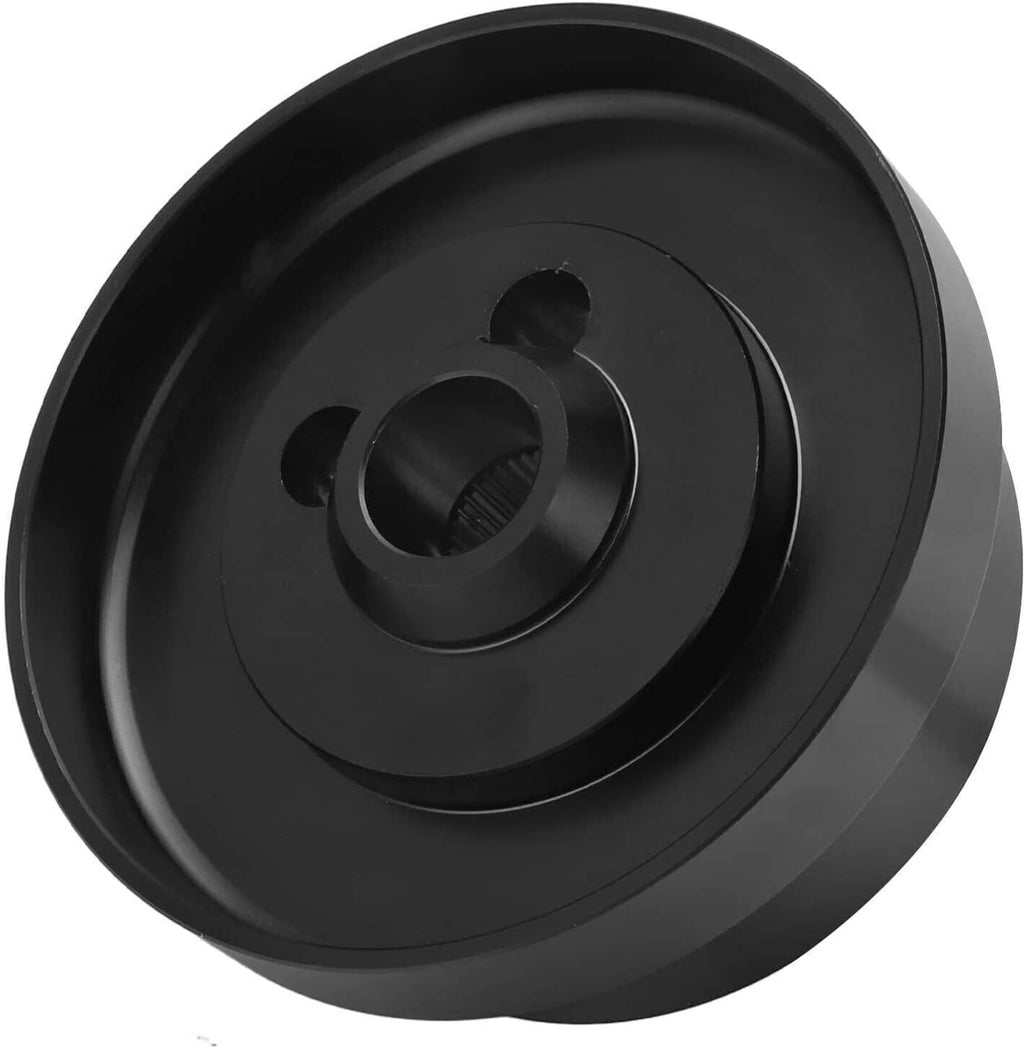 Close-up of black steering wheel hub adapter face with center splined opening