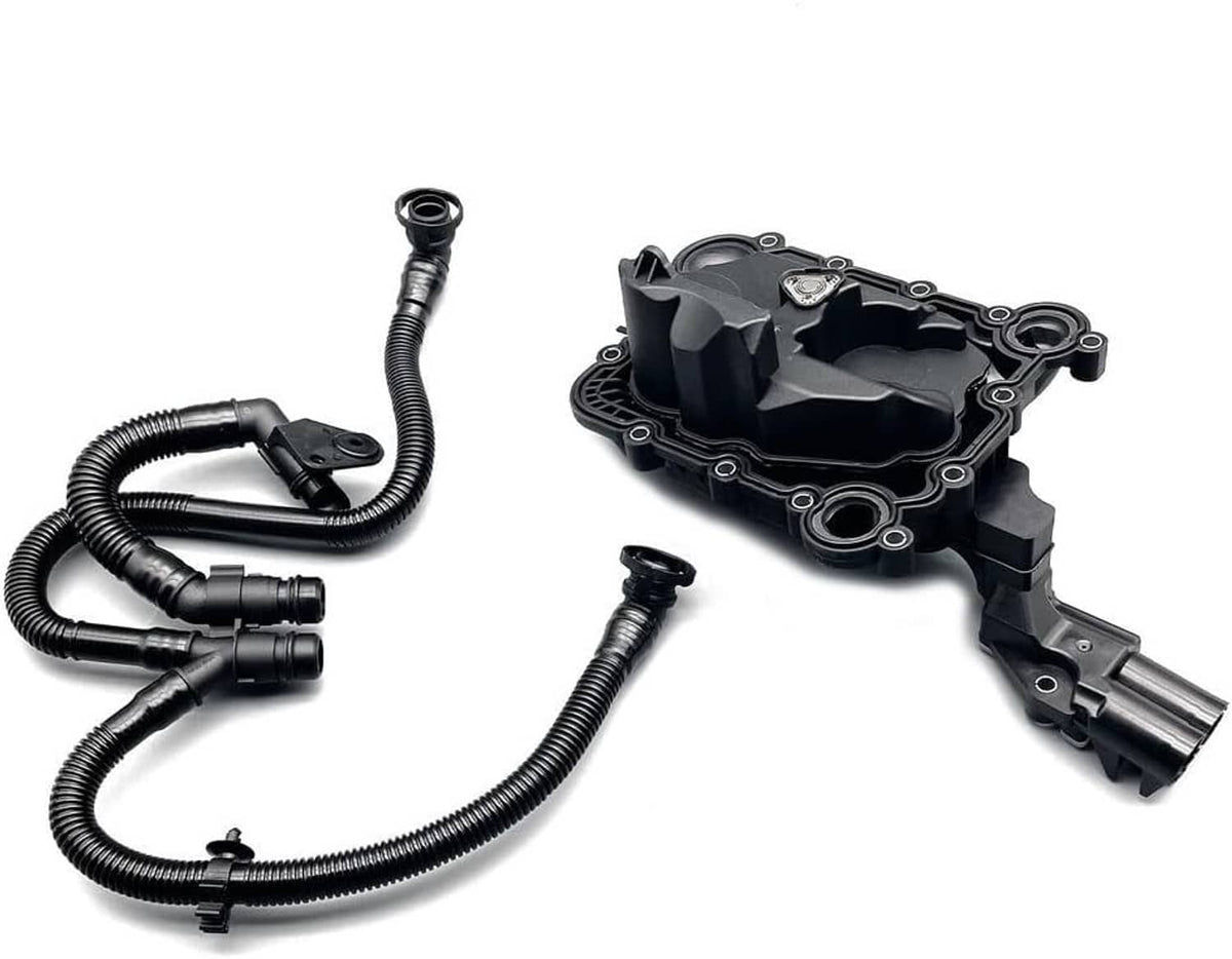 PCV oil separator valve assembly with connected black vacuum hoses and wiring loom