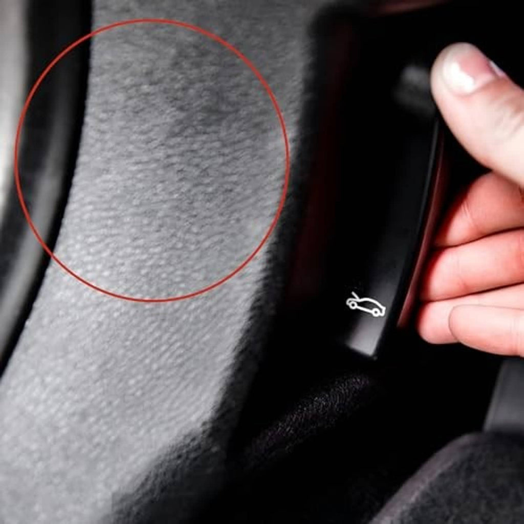 Hood latch release handle, black plastic with car release icon on the button.