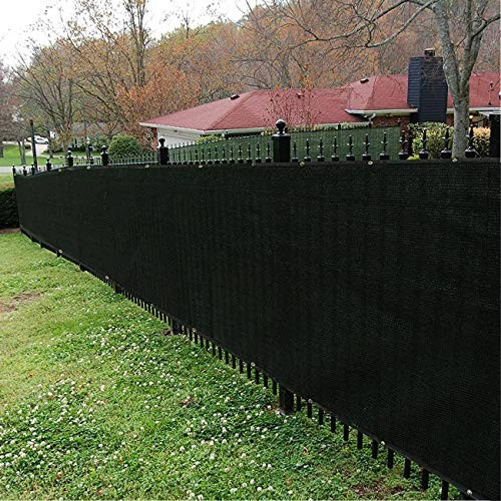 Black privacy screen fence with textured weave and grommets along the bottom edge
