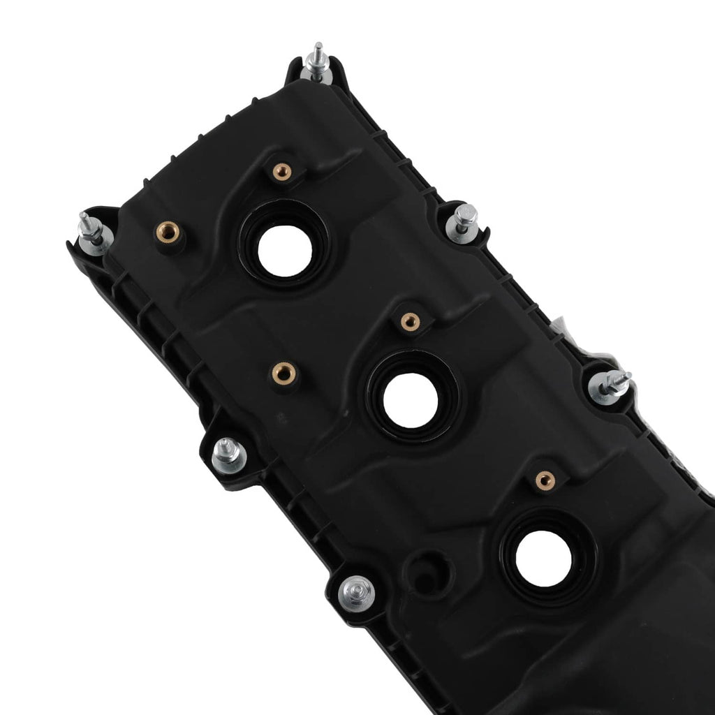 Black engine valve cover with three circular openings and mounting bolts, top view