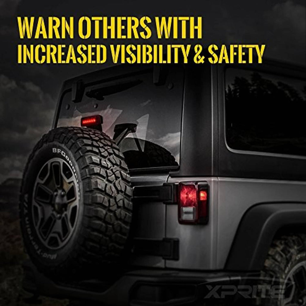 LED third brake light on vehicle tailgate area, smoke lens with bright red illumination