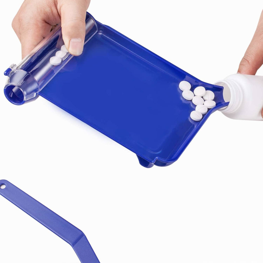 Blue plastic L-shaped pill tray with white pills inside, held in hands