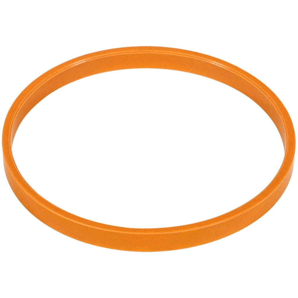 Orange hydraulic cylinder seal ring with smooth outer edge close-up