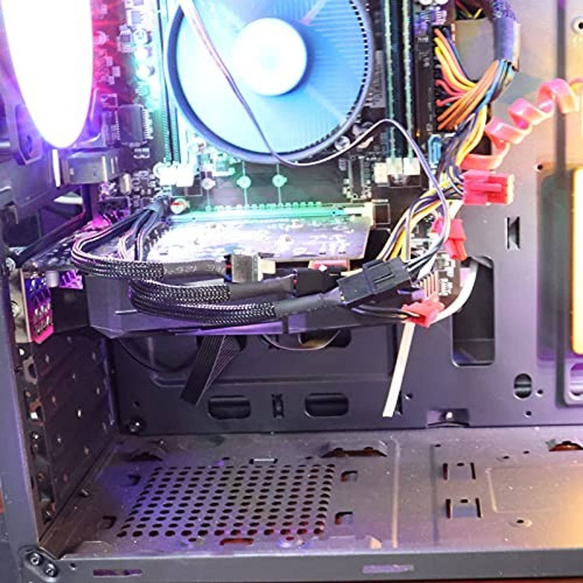 4-pin PWM fan splitter cable installed inside desktop PC with braided cable runs