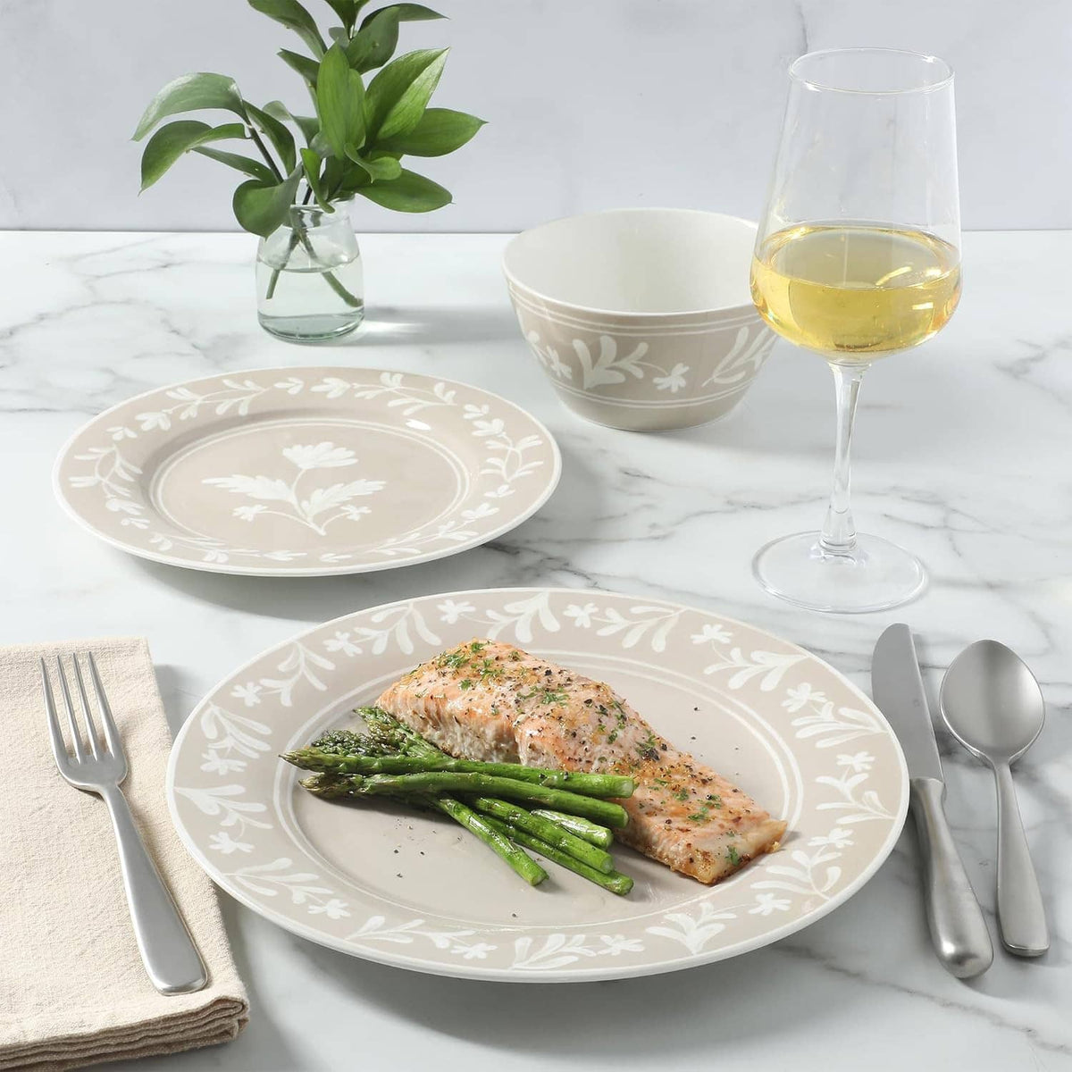 Taupe dinnerware set with white floral leaf border plate and coordinating bowls