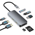 Gray USB-C dual HDMI docking station hub with multiple ports and memory-card slots