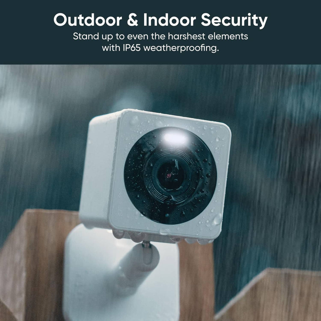 Weatherproof outdoor security camera with raindrops on the lens housing