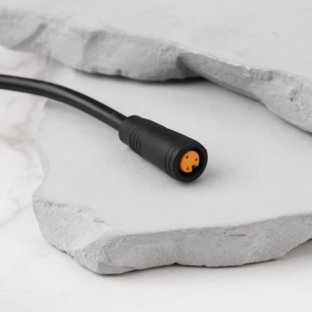 Black thumb throttle cable end with 3-pin plug and orange contacts