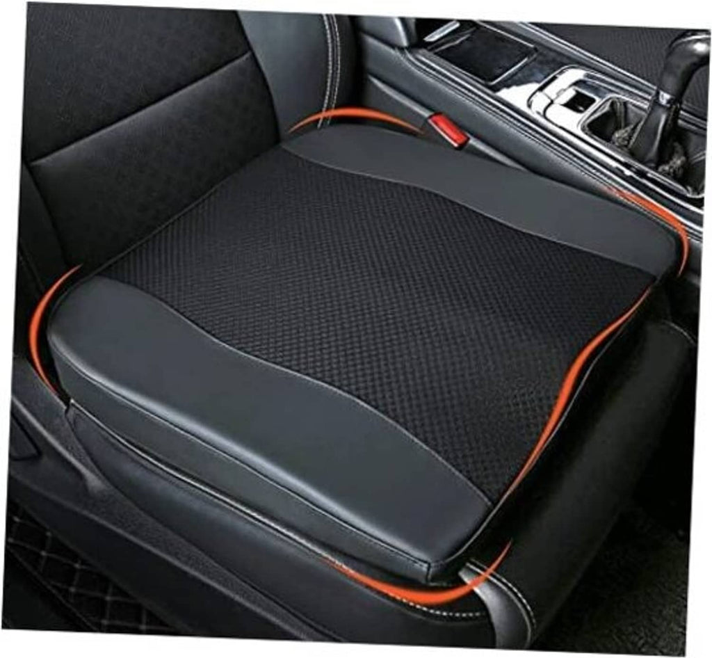 Black car seat cushion with textured mesh top and orange edge piping
