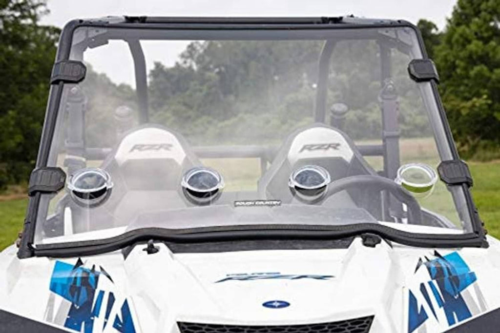 Full front windshield with tinted panel, black frame, and circular side mounts