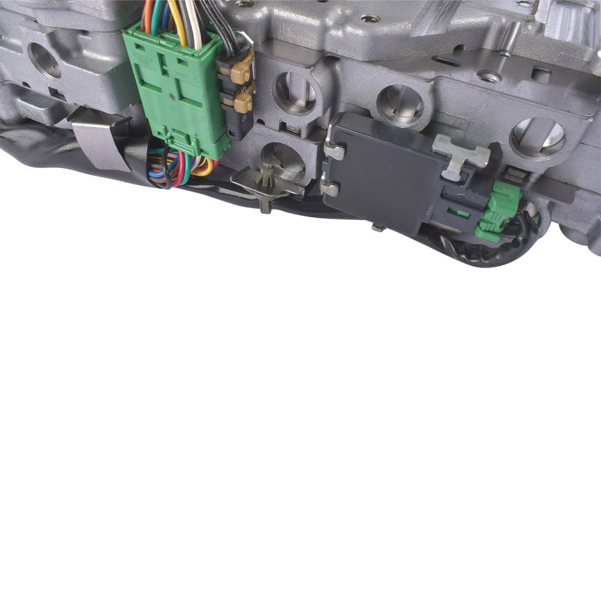 CVT valve body with stepper motor, close-up of green connectors and wiring terminal