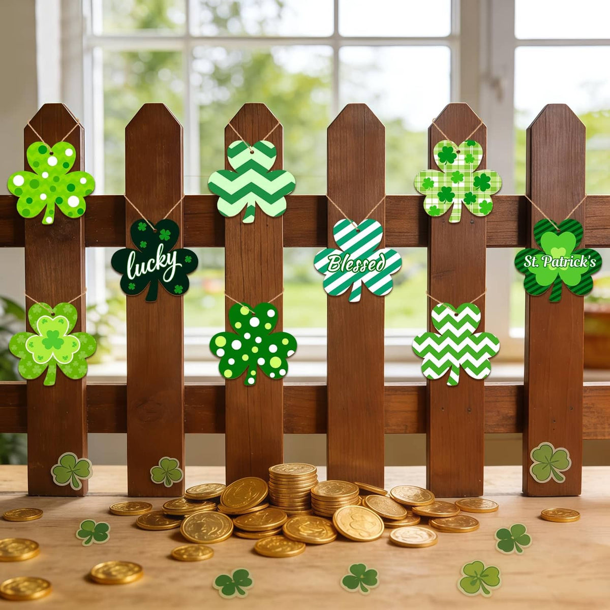 Wooden shamrock ornaments attached to a fence with hemp strings