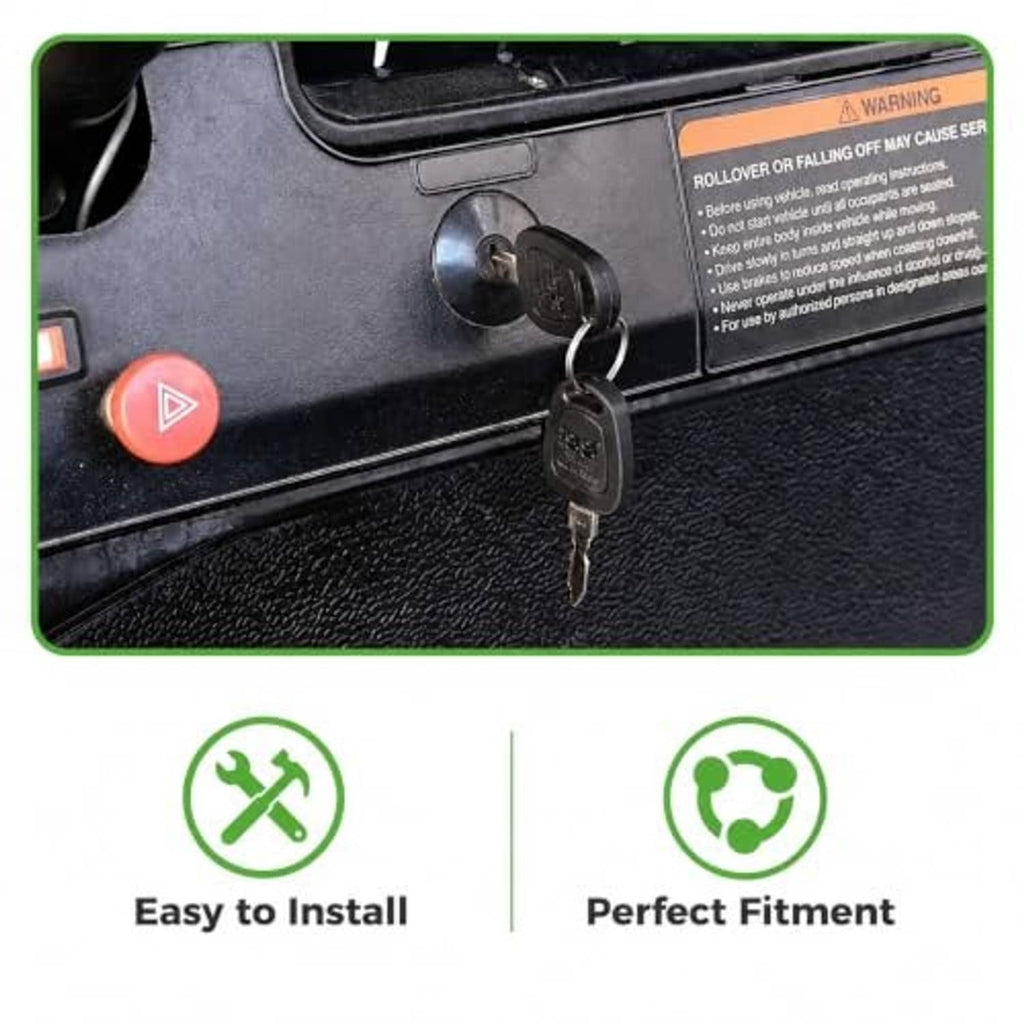 Ignition key switch with two keys inserted into a black golf cart control panel