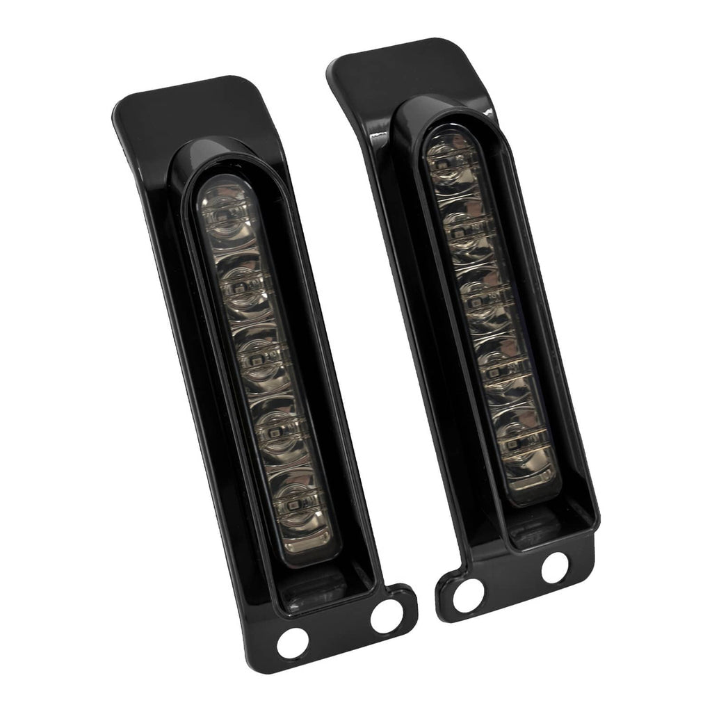 Black housing LED filler lights with clear lens bars and two round mounting points (pair).
