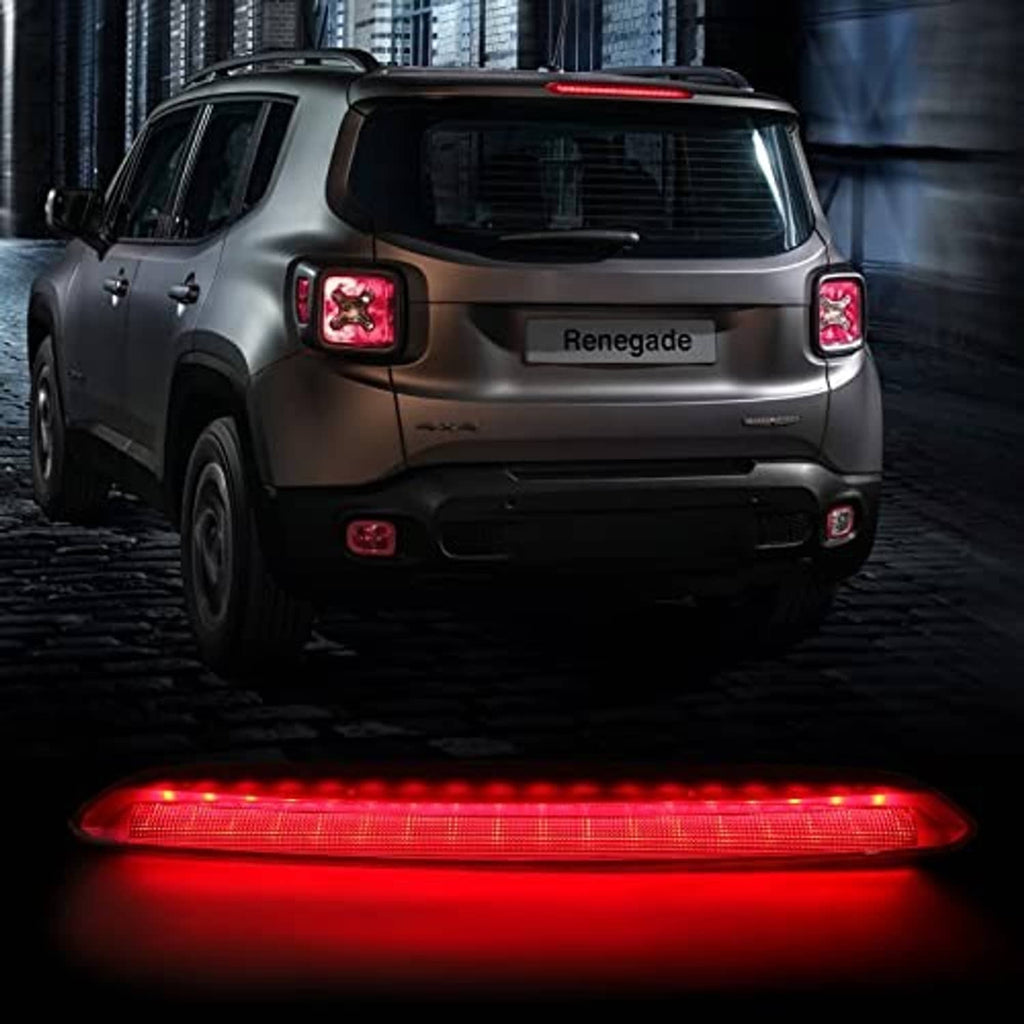 Red lit LED third brake light strip on SUV rear tailgate center