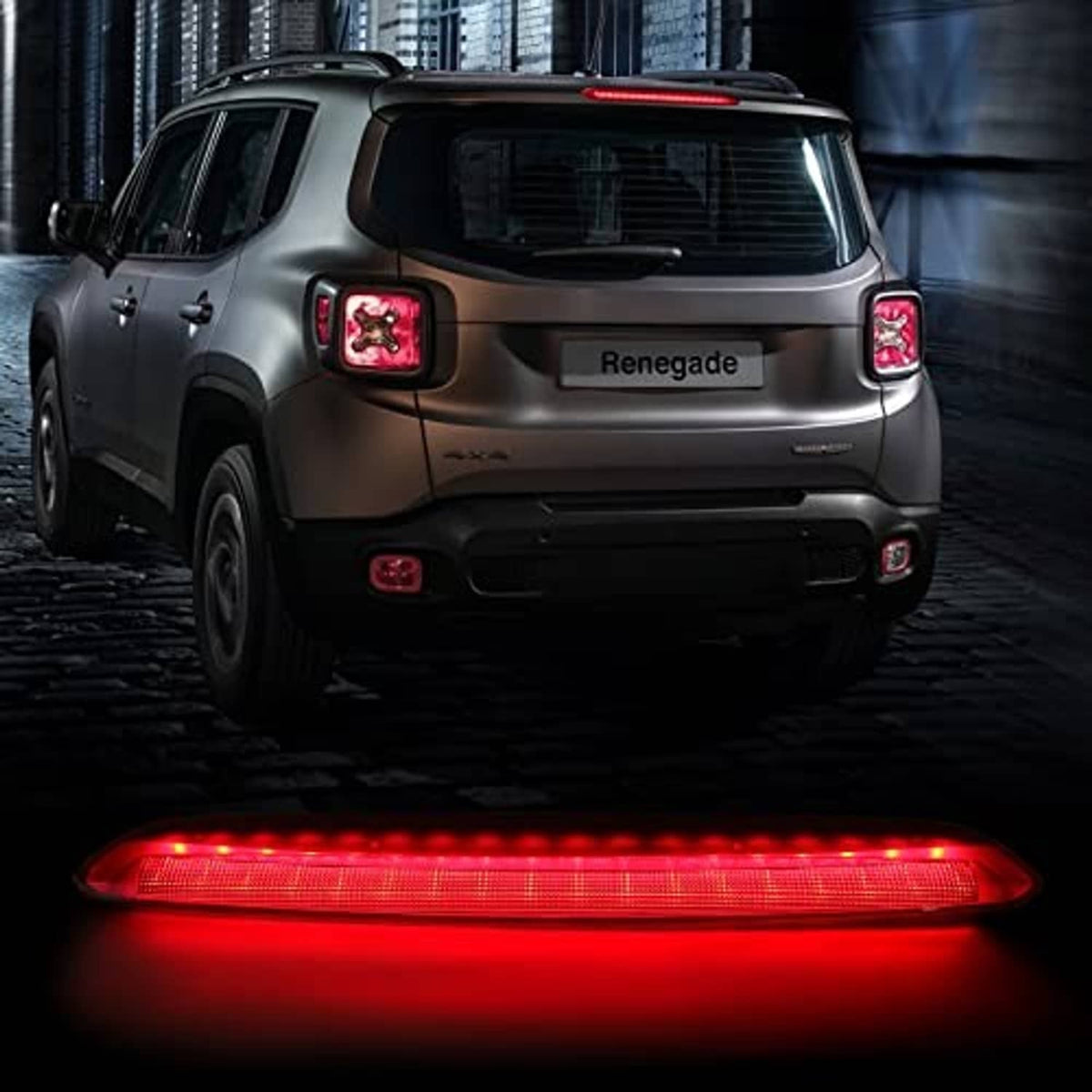 Red lit LED third brake light strip on SUV rear tailgate center