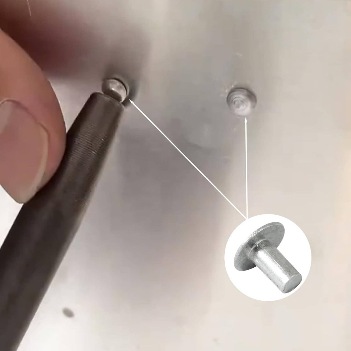 Brazier head aluminum rivet in place on material surface, silvery