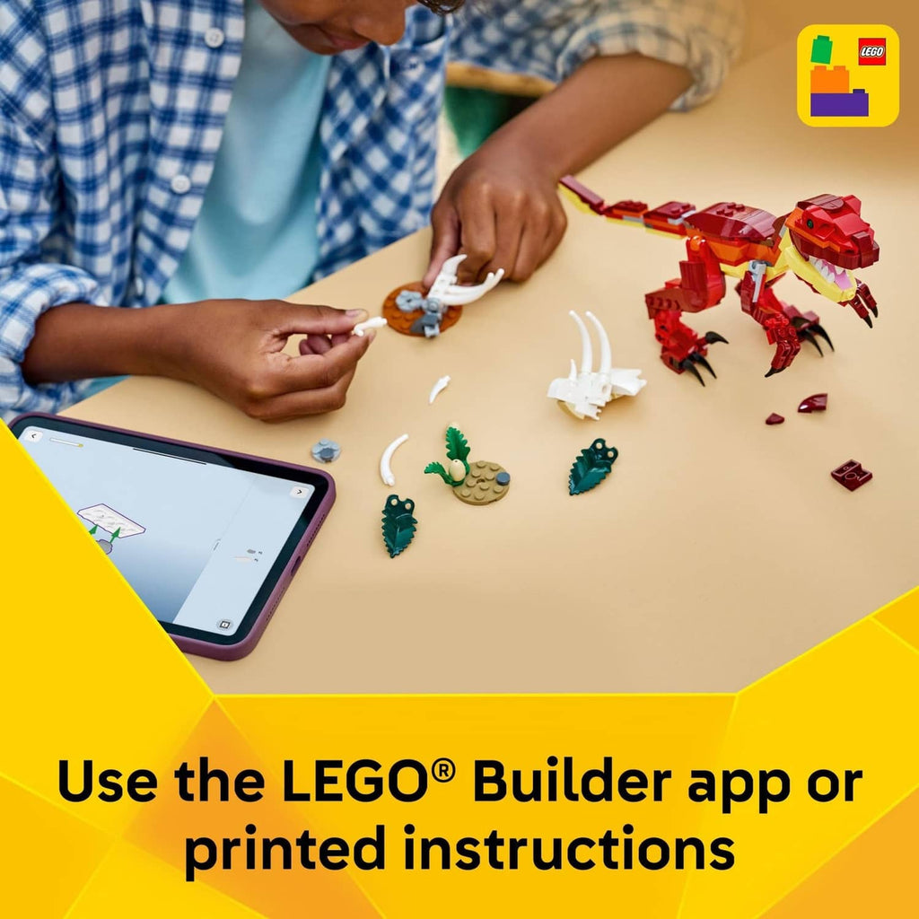 LEGO Creator dinosaur building toy being assembled with small red and white parts on a table