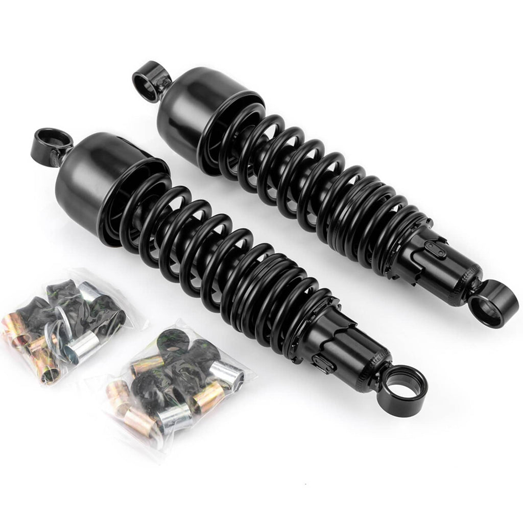 Pair of black rear motorcycle shocks with coil springs and mounting hardware bags