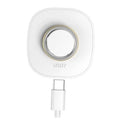 White wireless charging dock with circular ring contact and USB power connector