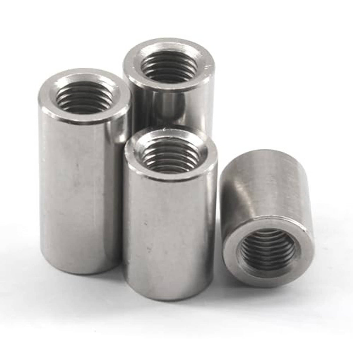 Stainless steel sleeve nuts bundle, round cylinders with dark internal threads