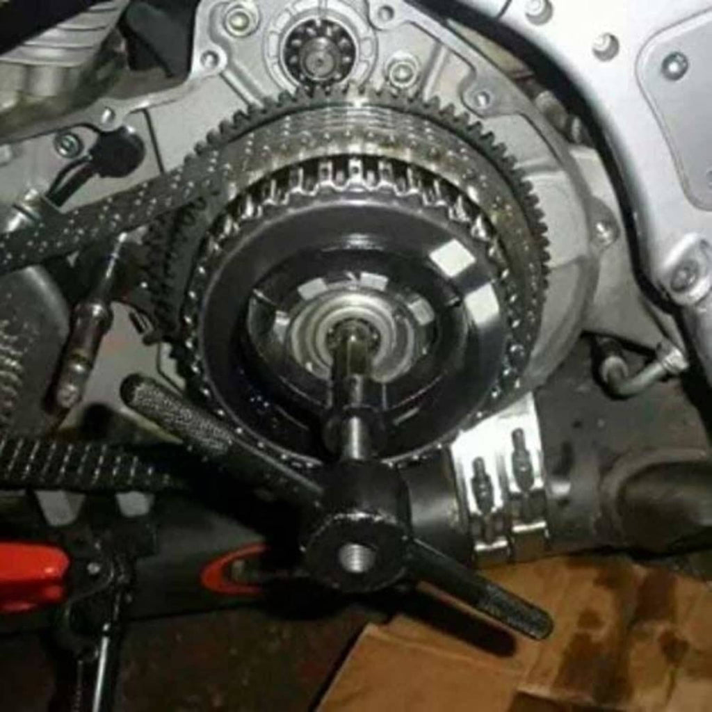 Motorcycle clutch housing with clutch spring area and compressor tool in place