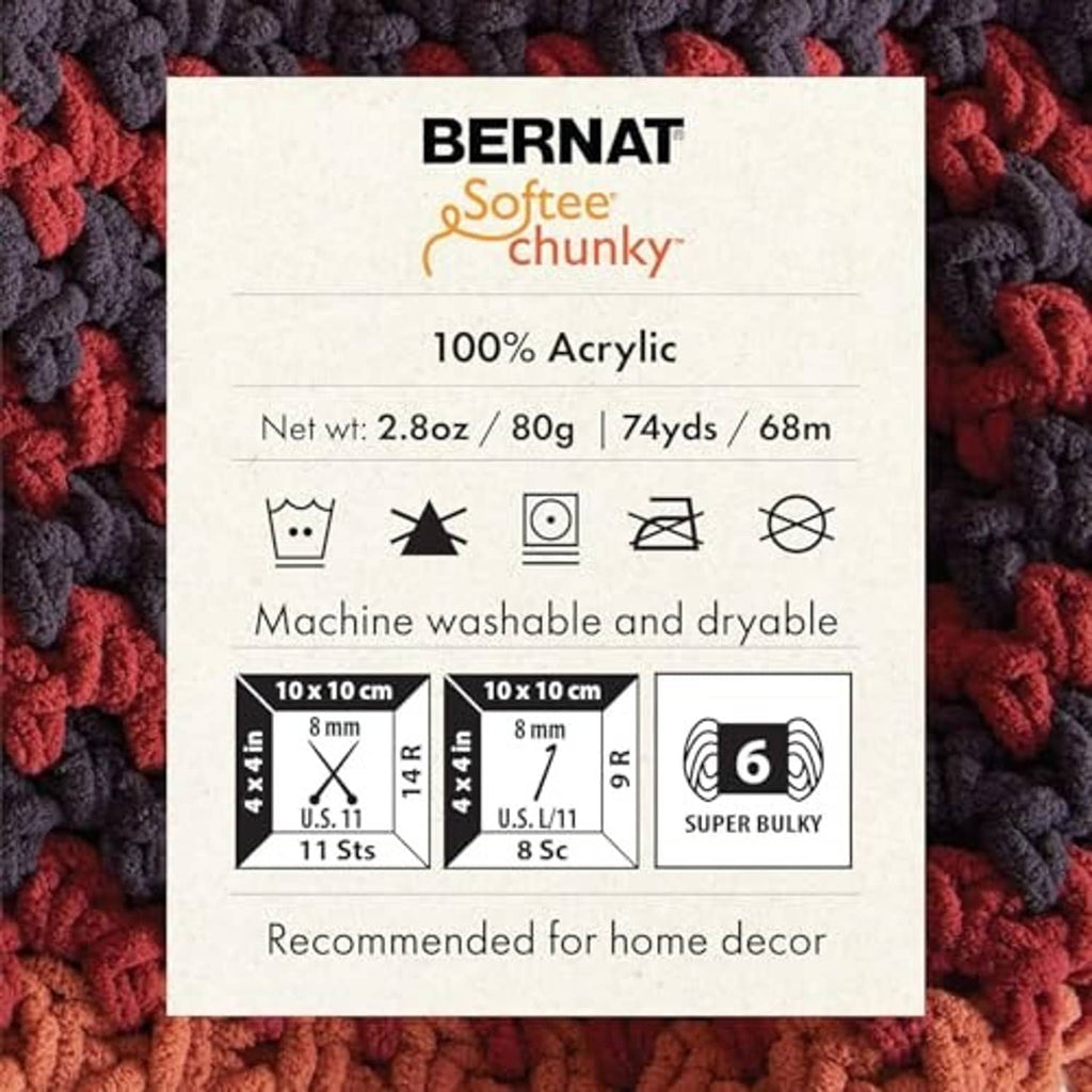Bernat Softee Chunky yarn label over chunky maroon and gray textured yarn