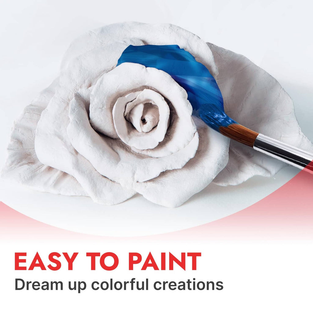 Air-dry clay rose with paintbrush applying blue color to the petals