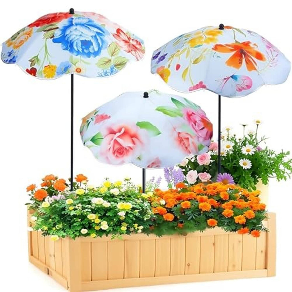 Triple floral plant umbrellas over a wooden planter filled with flowers