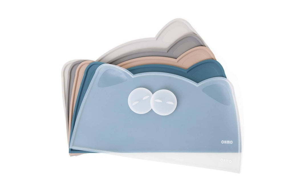 Stack of light-blue silicone cat can lids with paw-hole design