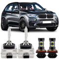 Vehicle headlight conversion kit with four HID bulbs, clear housings and black bases