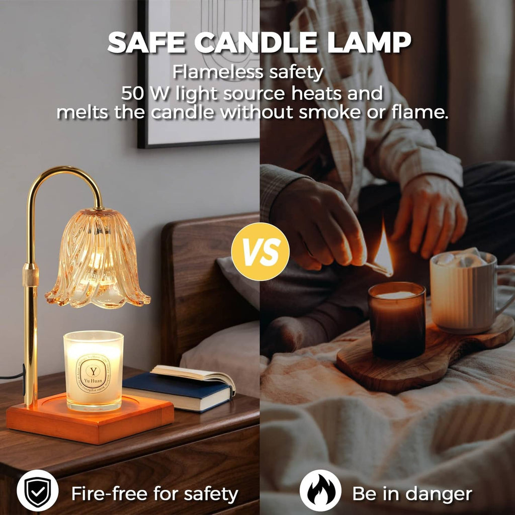 Gold flameless candle lamp with glass flower shade and lit jar candle with remote control