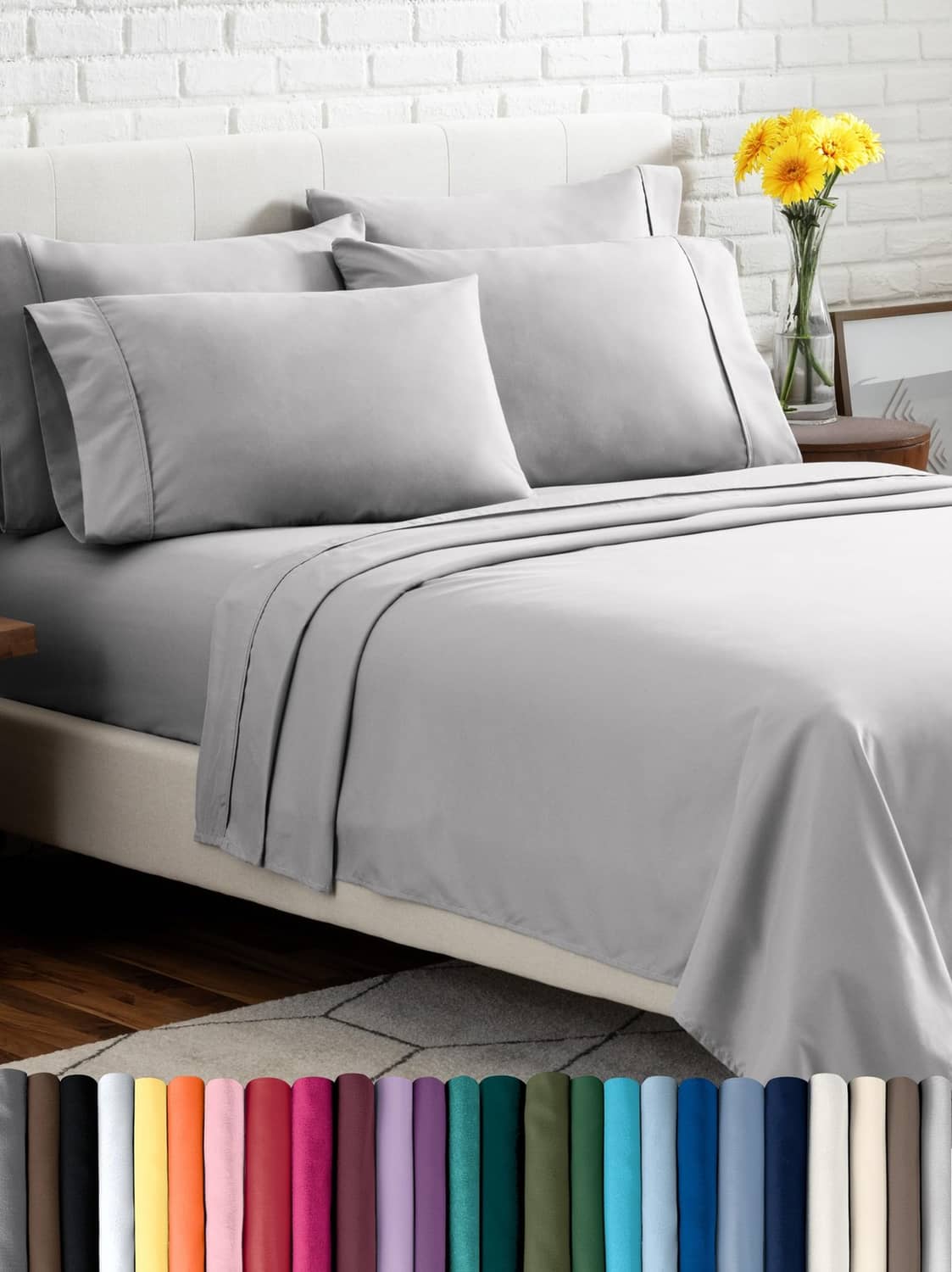 Light grey queen bed linen set with pillow shams and coordinated sheets