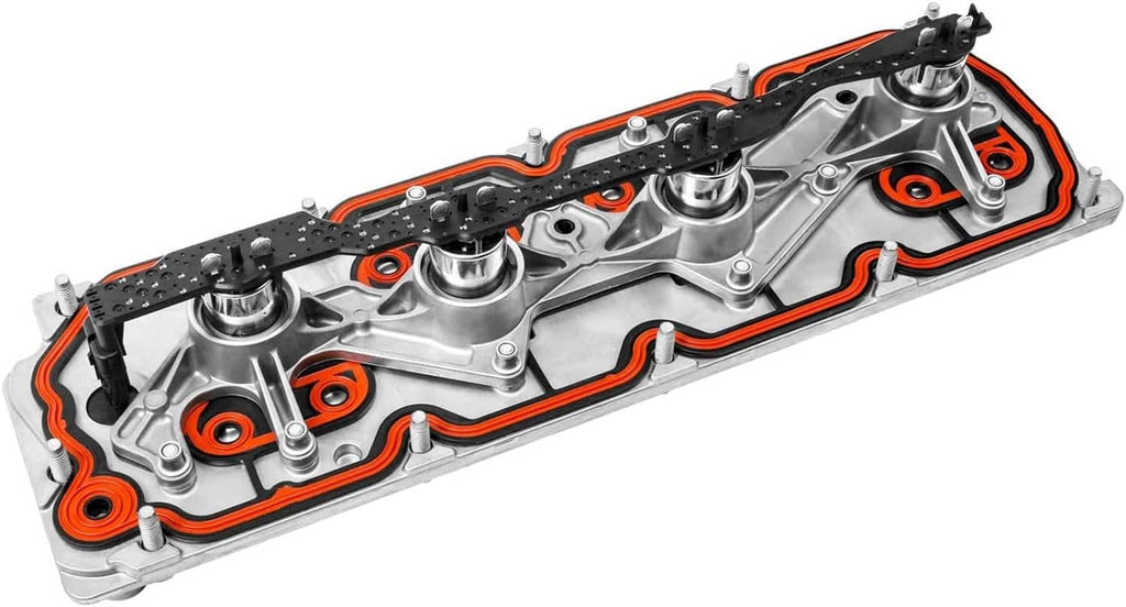Valve cover with orange seal outline and multiple circular cap mounts