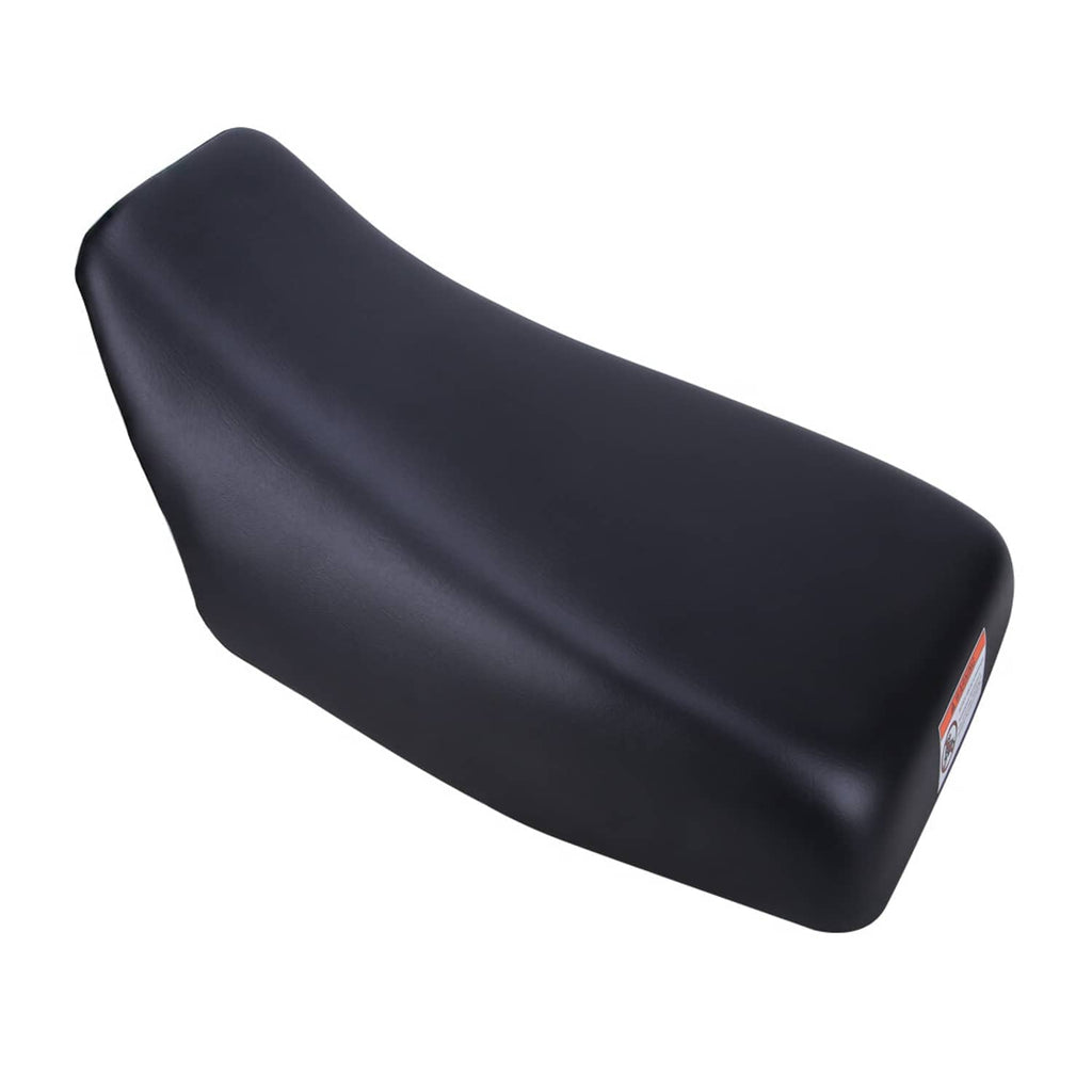 Black ATV seat replacement cushion, curved profile with warning label at side