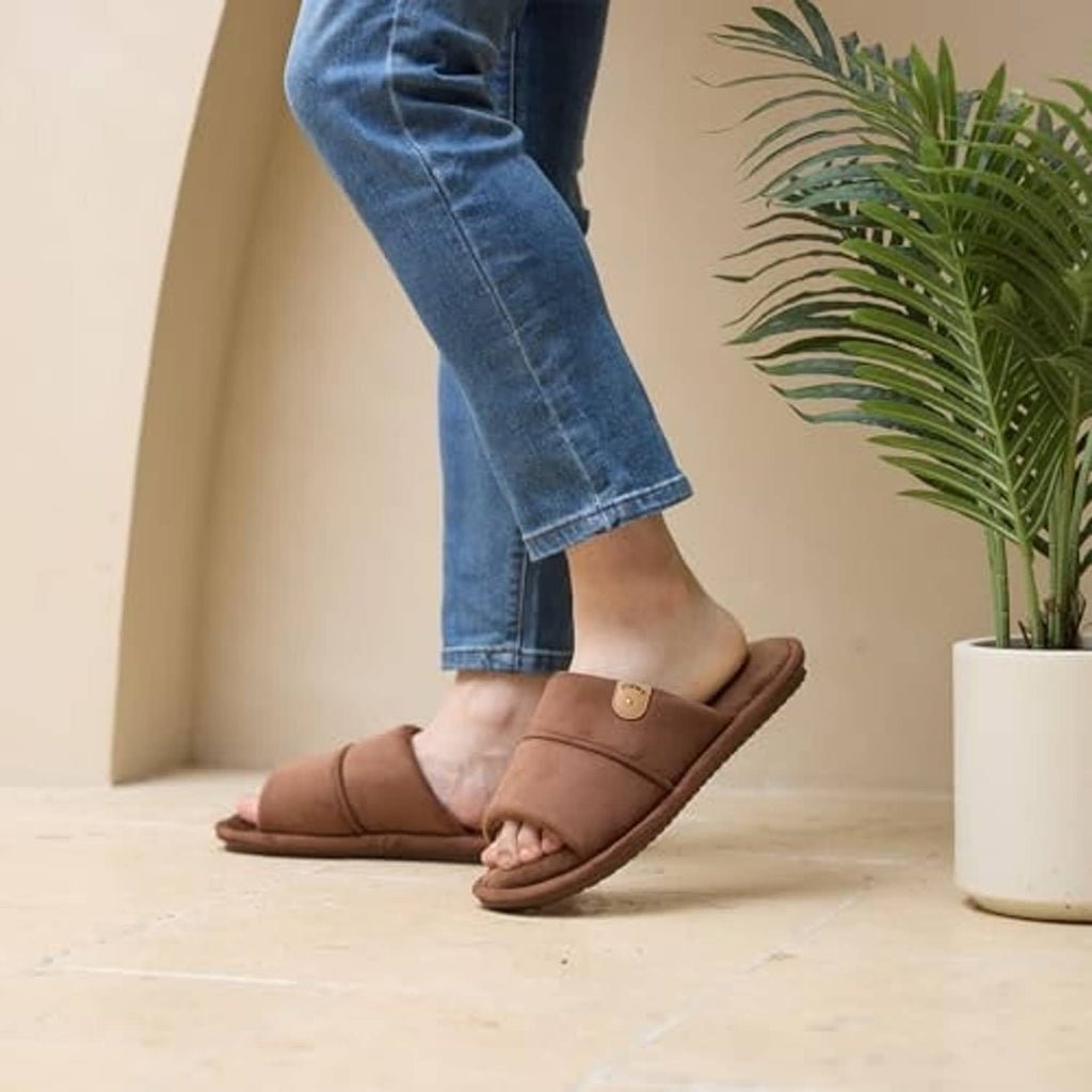Men's coffee-brown open-toe slippers worn with jeans, comfort slide sandal