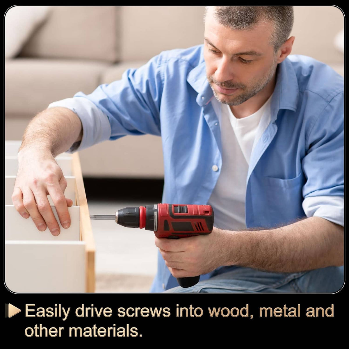 Gray Torx T20 screwdriver bit attached to a red power drill, driving a screw
