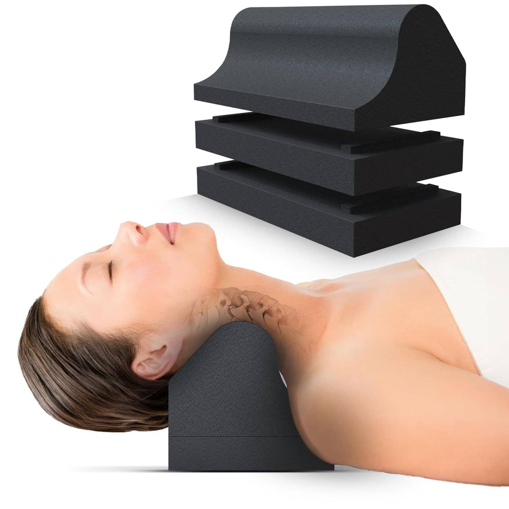 Black cervical traction neck orthotic foam blocks supporting head and neck